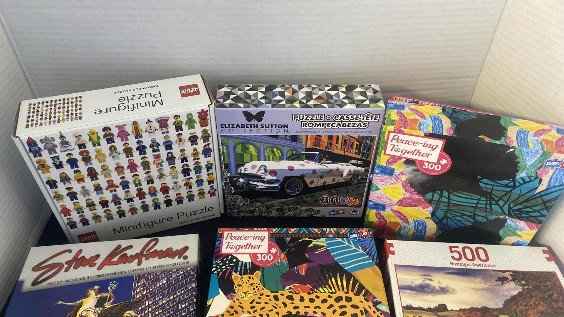 Photo 1 of 8 PUZZLES (unknown if missing pieces)