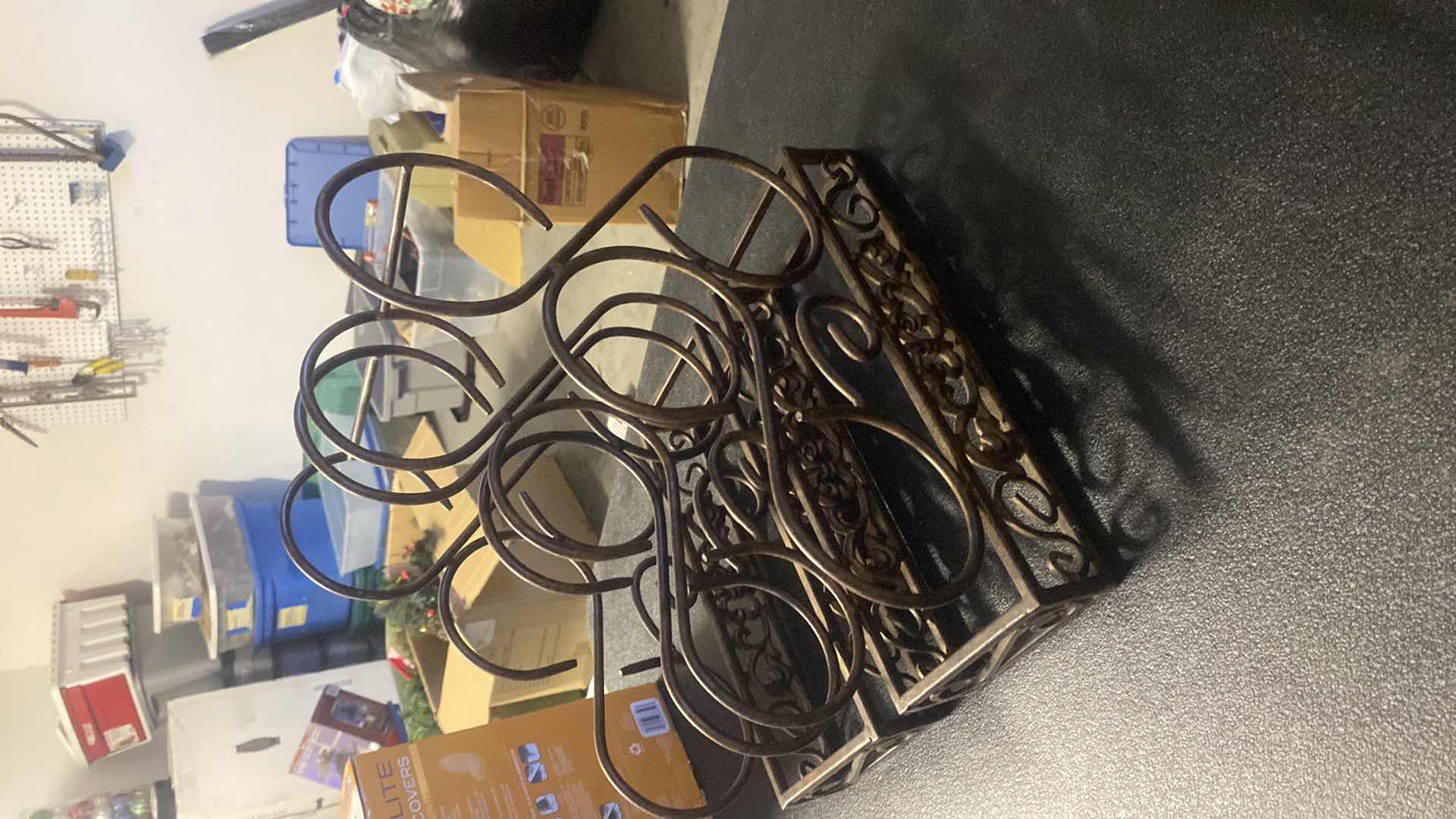 Photo 1 of PAIR OF IRON WINE HOLDERS