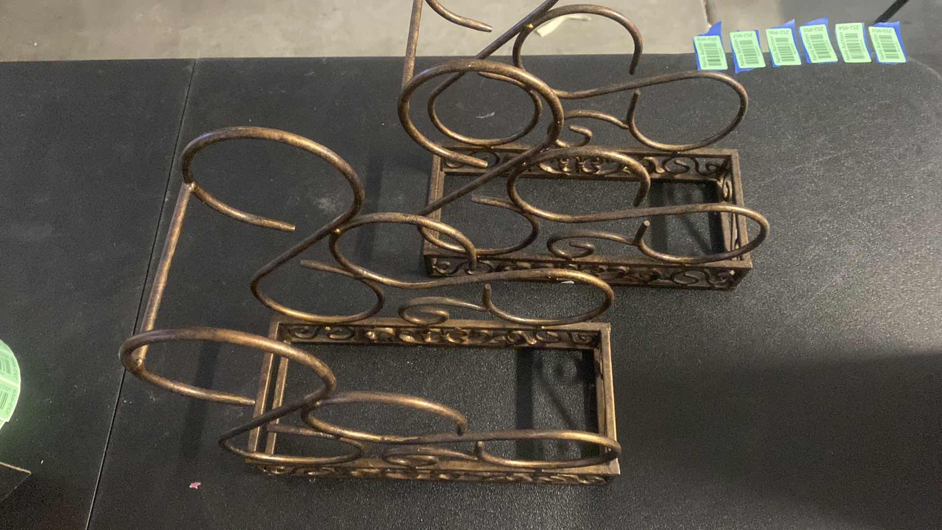 Photo 1 of PAIR OF IRON WINE HOLDERS