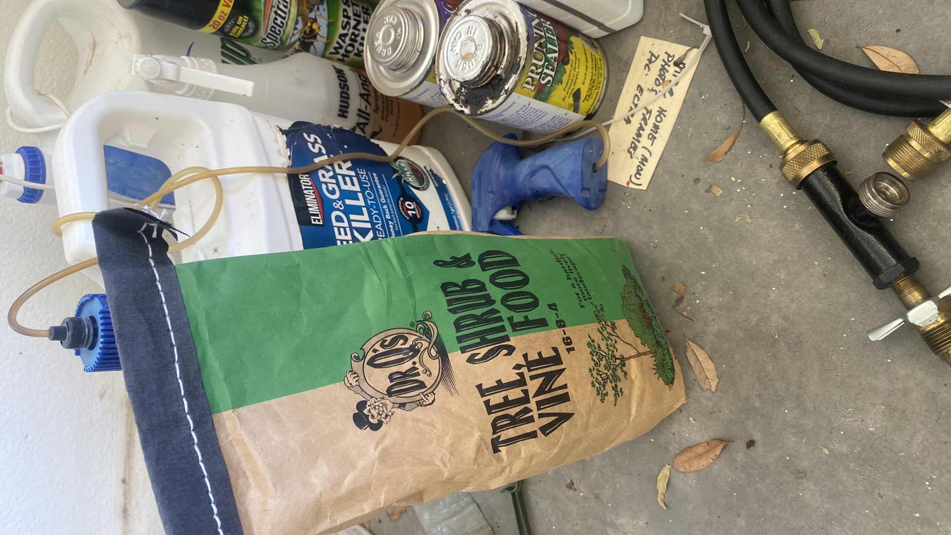 Photo 1 of GARDEN CHEMICALS IN TOTE