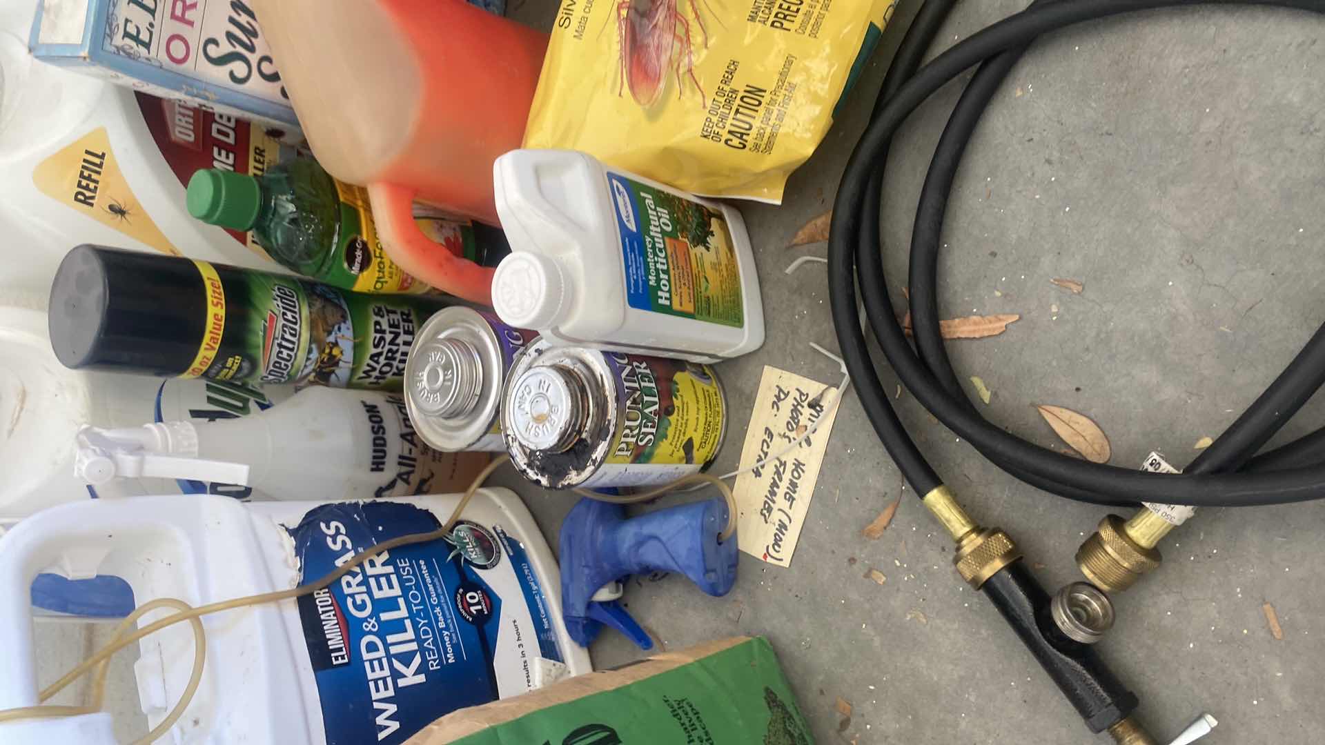 Photo 1 of GARDEN CHEMICALS IN TOTE