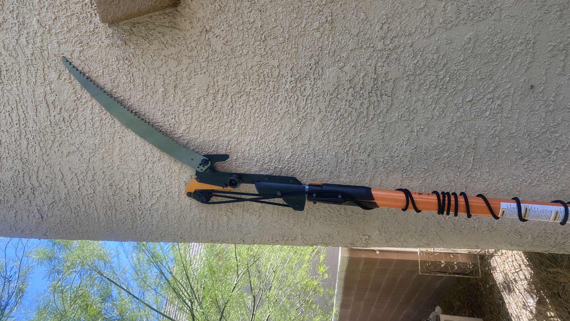 Photo 1 of FISKAR TREE TRIMMER