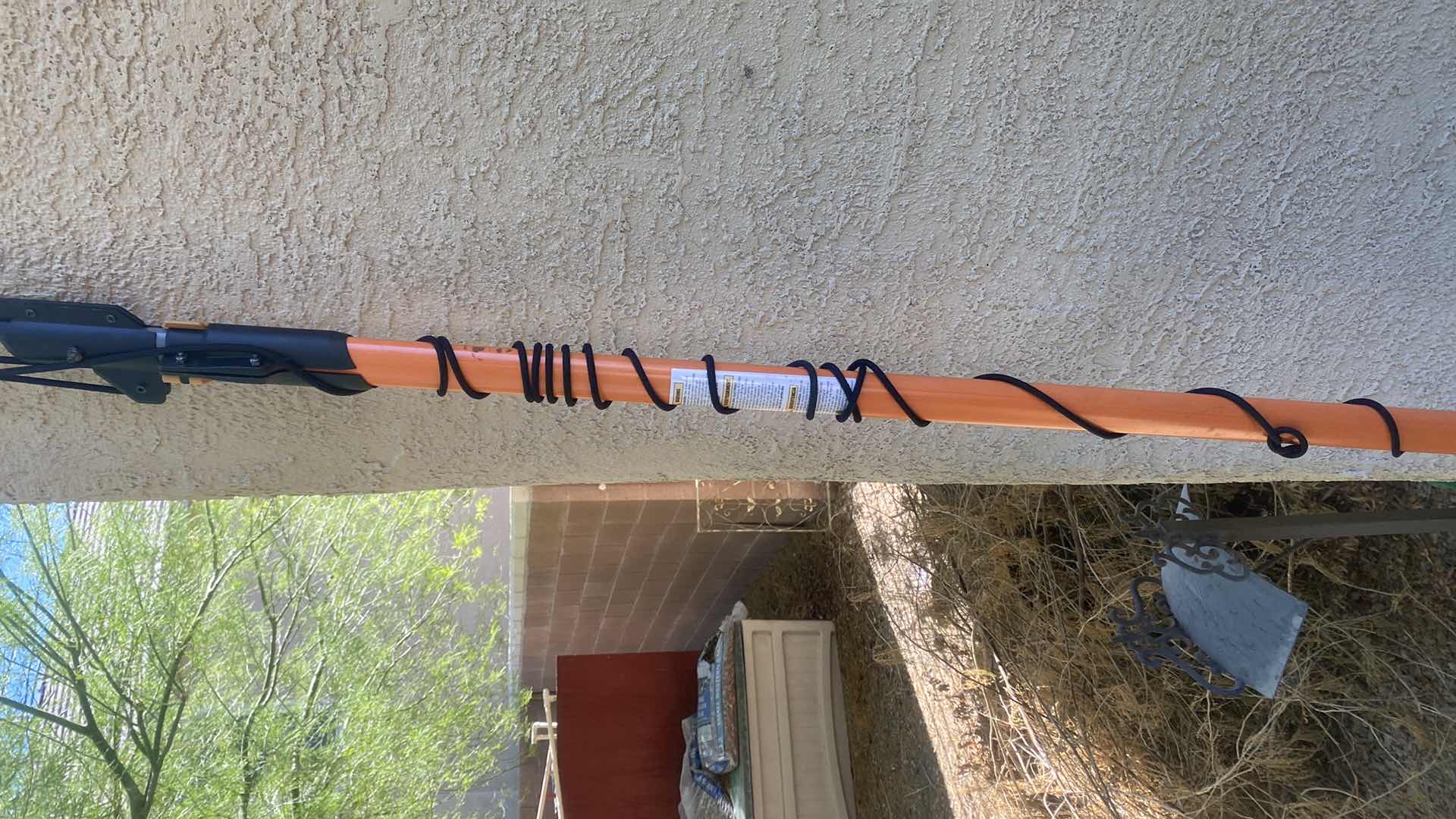 Photo 1 of FISKAR TREE TRIMMER