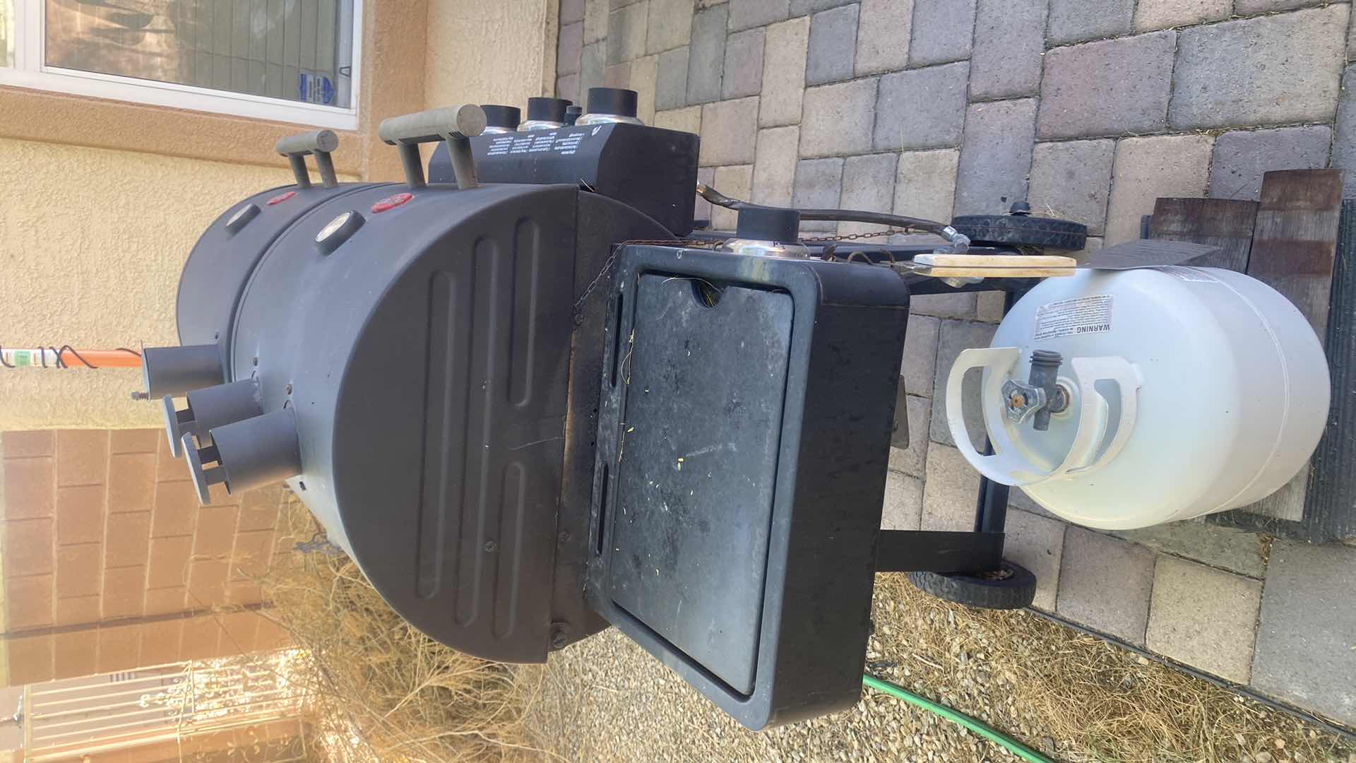 Photo 1 of PROFESSIONAL CHAR-GRILLER WITH PROPANE TANK 66“ x 25“ H53”