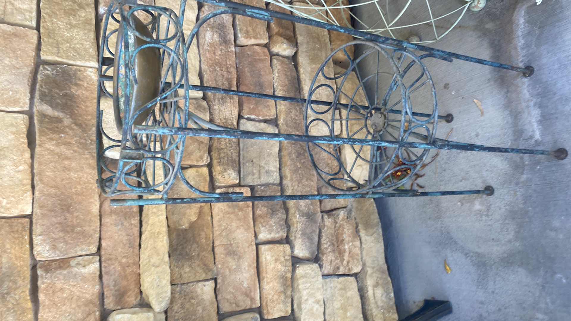 Photo 1 of PLASTIC BARREL POT WITH FAUX FLOWERS & GREEN METAL DECOR H44”