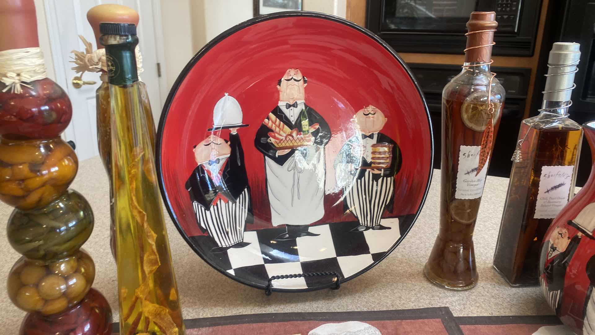 Photo 1 of CERTIFIED INTERNATIONAL “DINNER IS SERVED" BOWL & PITCHER WITH 2 PLACEMATS & 5 BOTTLES VINEGAR HERBS