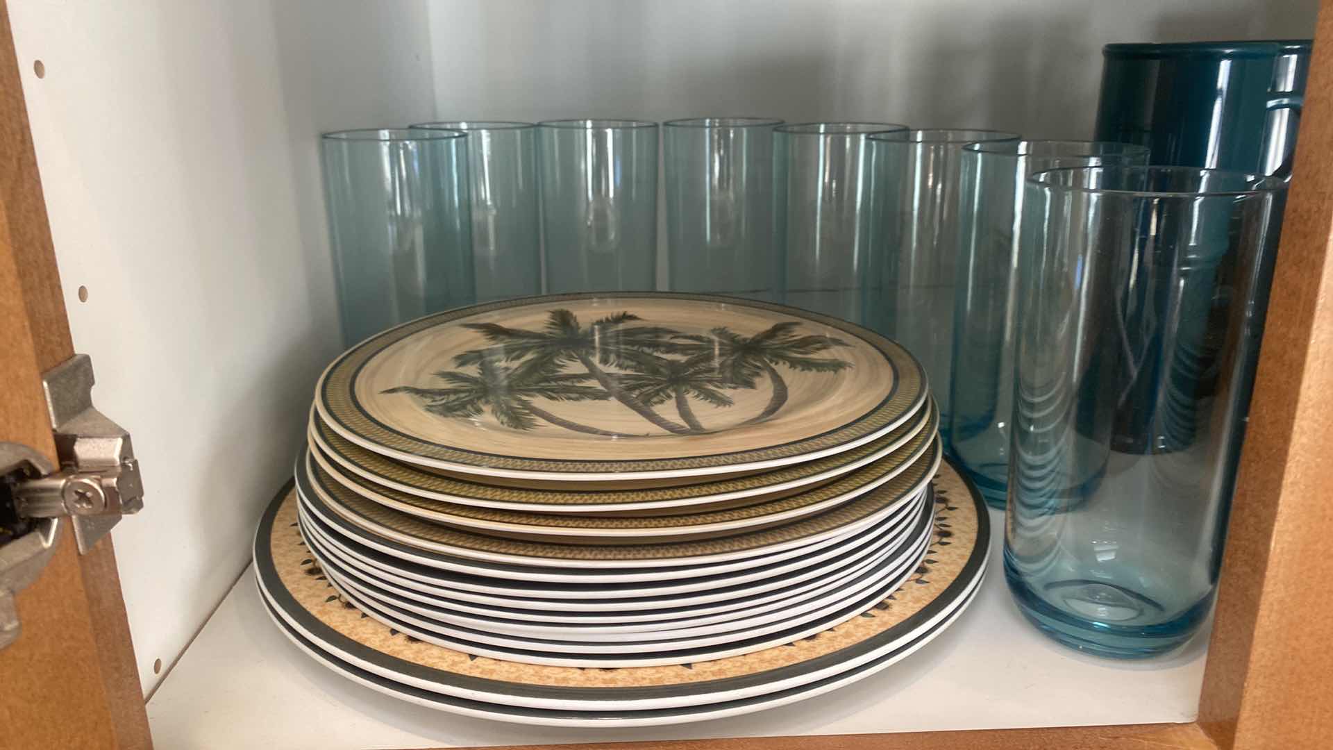 Photo 1 of CONTENTS OF CABINET - 1 SHELF MELAMINE DISHES, COFFEE CUPS, GLASSES & PITCHER, 1 SHELF STEMWARE
