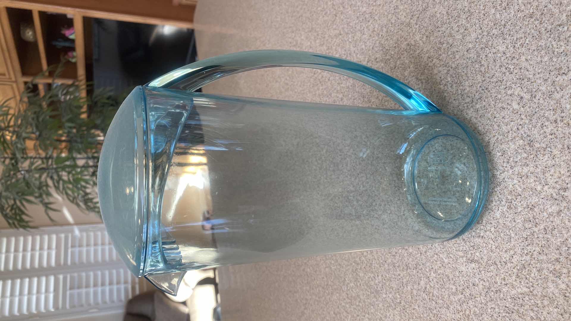 Photo 1 of CONTENTS OF CABINET - 1 SHELF MELAMINE DISHES, COFFEE CUPS, GLASSES & PITCHER, 1 SHELF STEMWARE