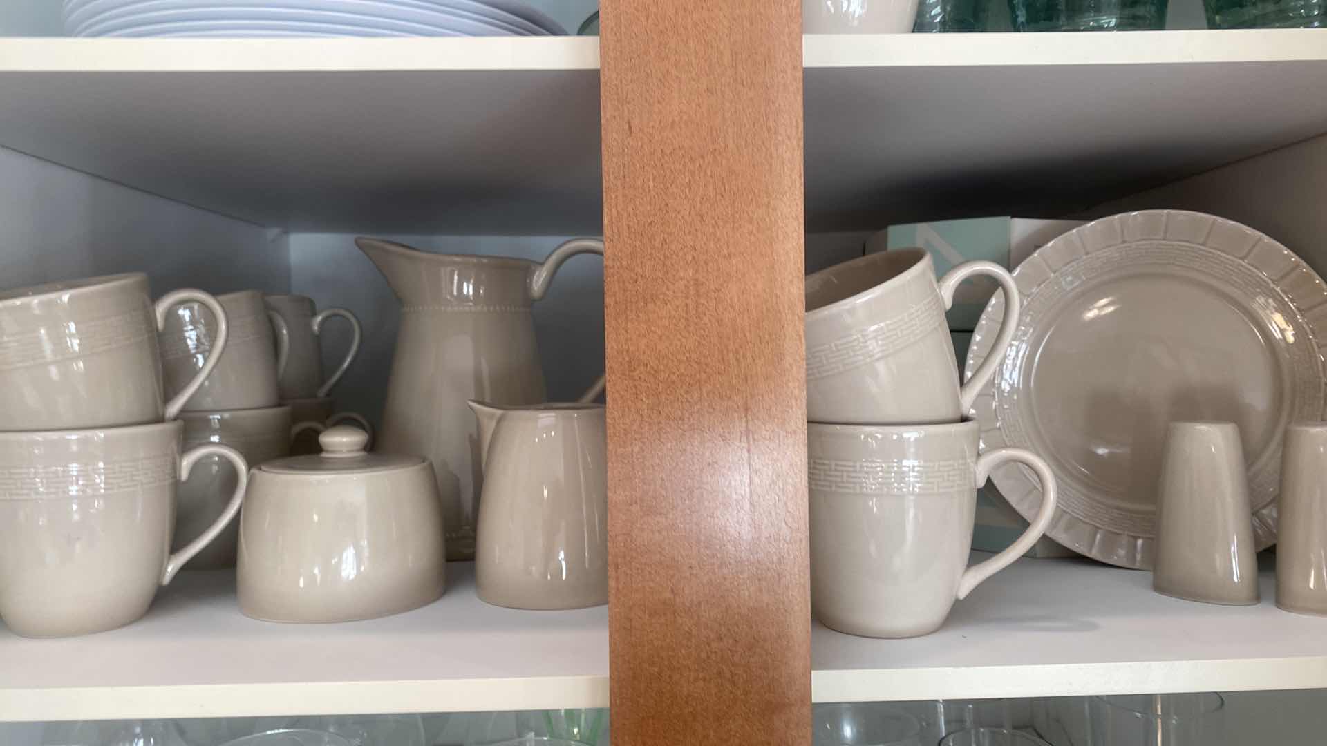 Photo 1 of CONTENTS OF CABINET - 36 PIECE MARTHA STEWART CERAMIC LUNCH SET 12 PLATES & COFFEE CUPS, PITCHER SALT PEPPER CREAM & SUGAR 1 PLATTER 5 BOWLS