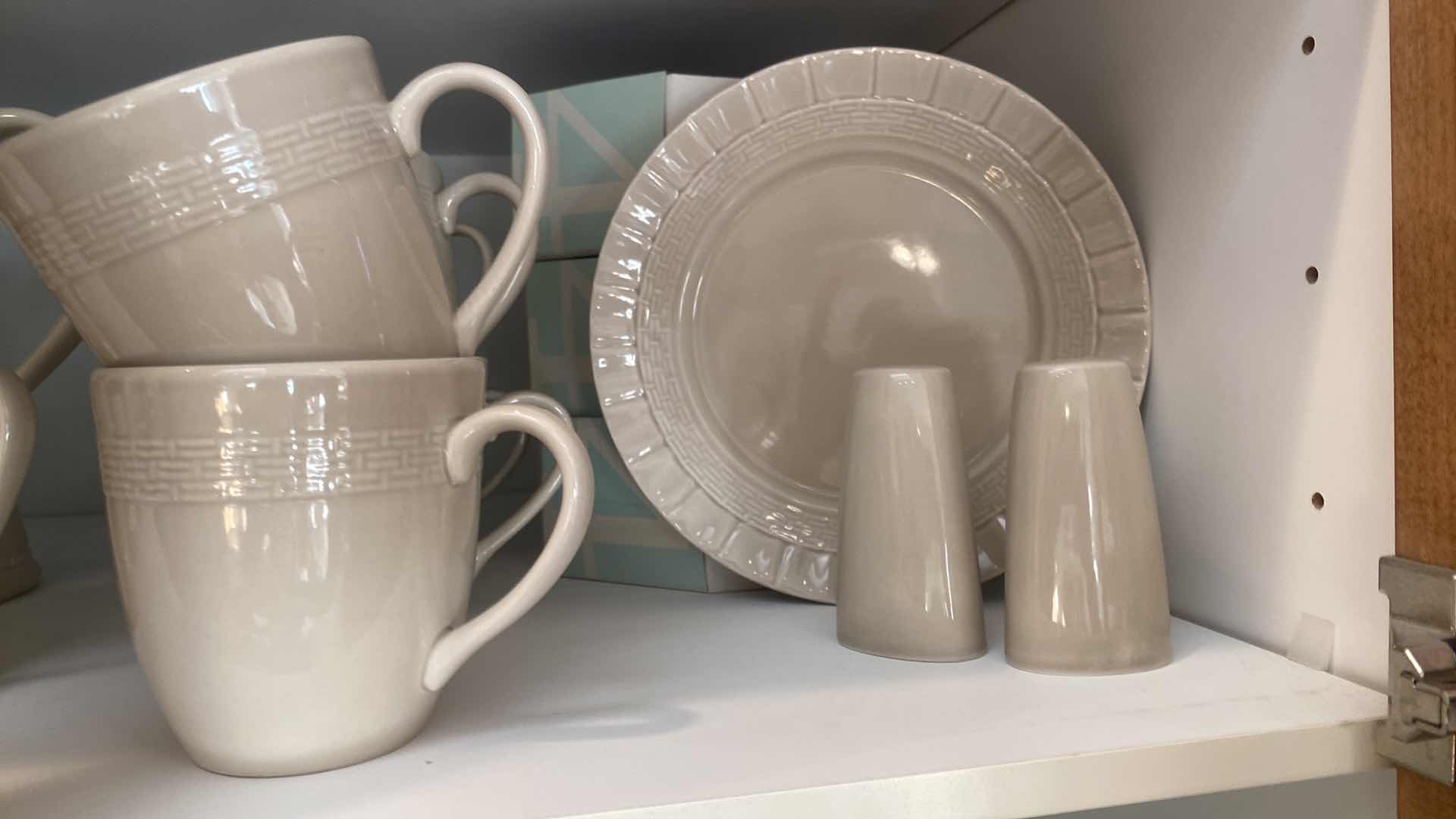 Photo 1 of CONTENTS OF CABINET - 36 PIECE MARTHA STEWART CERAMIC LUNCH SET 12 PLATES & COFFEE CUPS, PITCHER SALT PEPPER CREAM & SUGAR 1 PLATTER 5 BOWLS