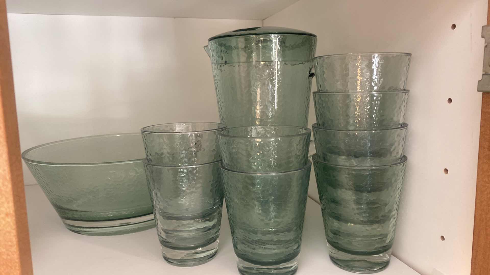 Photo 1 of CONTENTS OF CABINET - 16 PRESIDIO MELAMINE BOWLS & PLATES, 11 PIECE PLASTIC PITCHER BOWL & GLASSES