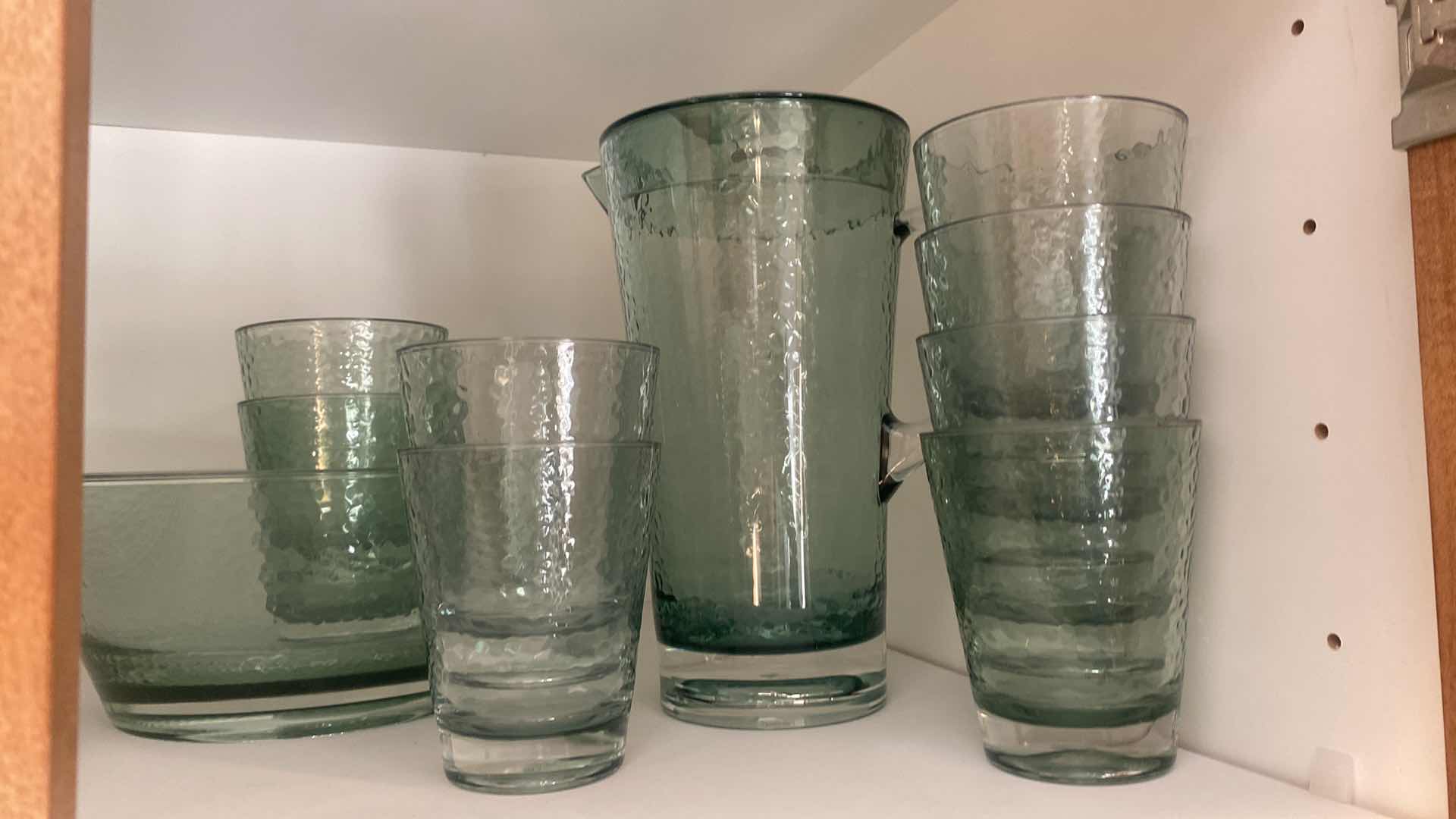 Photo 1 of CONTENTS OF CABINET - 16 PRESIDIO MELAMINE BOWLS & PLATES, 11 PIECE PLASTIC PITCHER BOWL & GLASSES