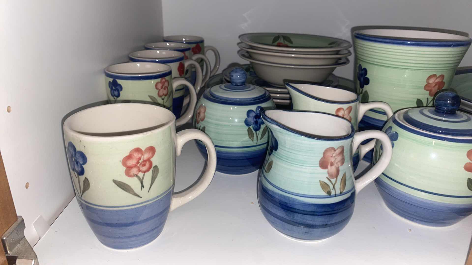 Photo 1 of CONTENTS OF CABINET - 1 SHELF 33 PIECES EMERILS COLLECTION PLATES BOWL COFFEE CUPS & MORE