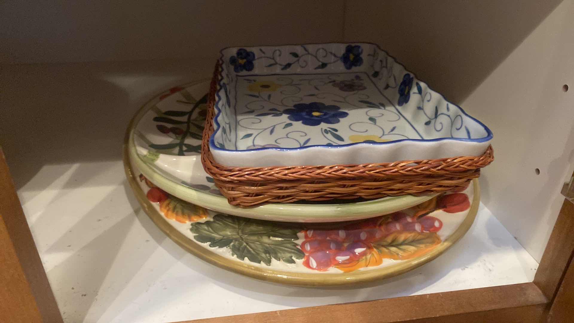 Photo 1 of CONTENTS OF CABINET - 2 SHELFS CERAMIC SERVE WARE & GLASS PITCHER