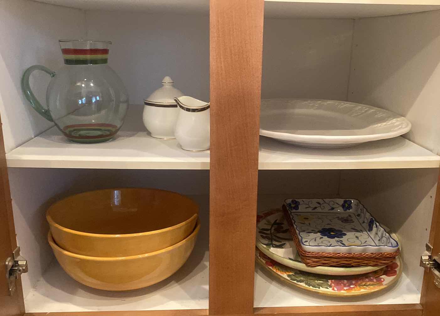 Photo 1 of CONTENTS OF CABINET - 2 SHELFS CERAMIC SERVE WARE & GLASS PITCHER