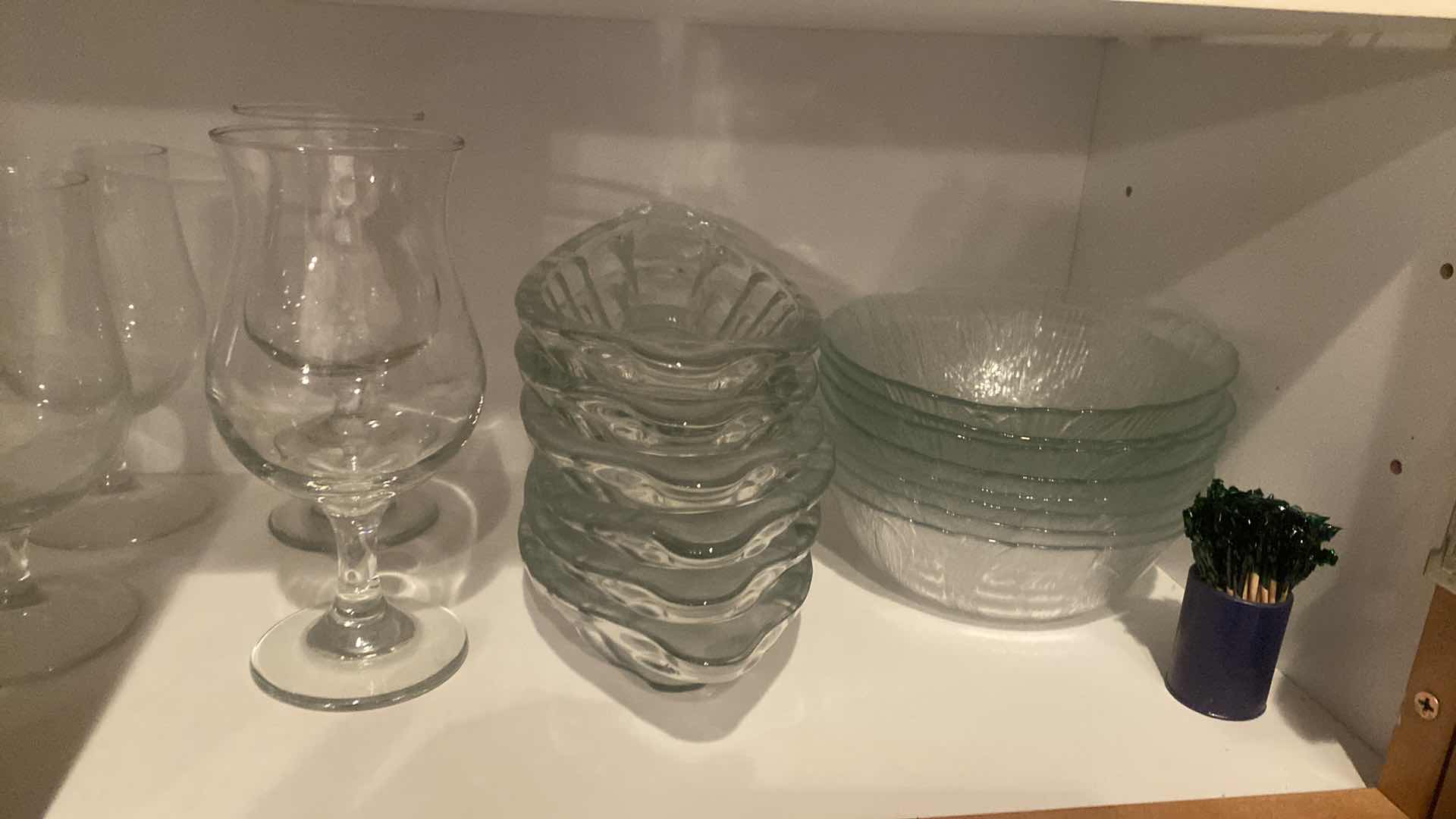 Photo 1 of CONTENTS OF CABINET - PLASTIC BOWLS, GLASS VASES, GLASSES, GLASS SUNDAE DISHES & SALAD BOWLS