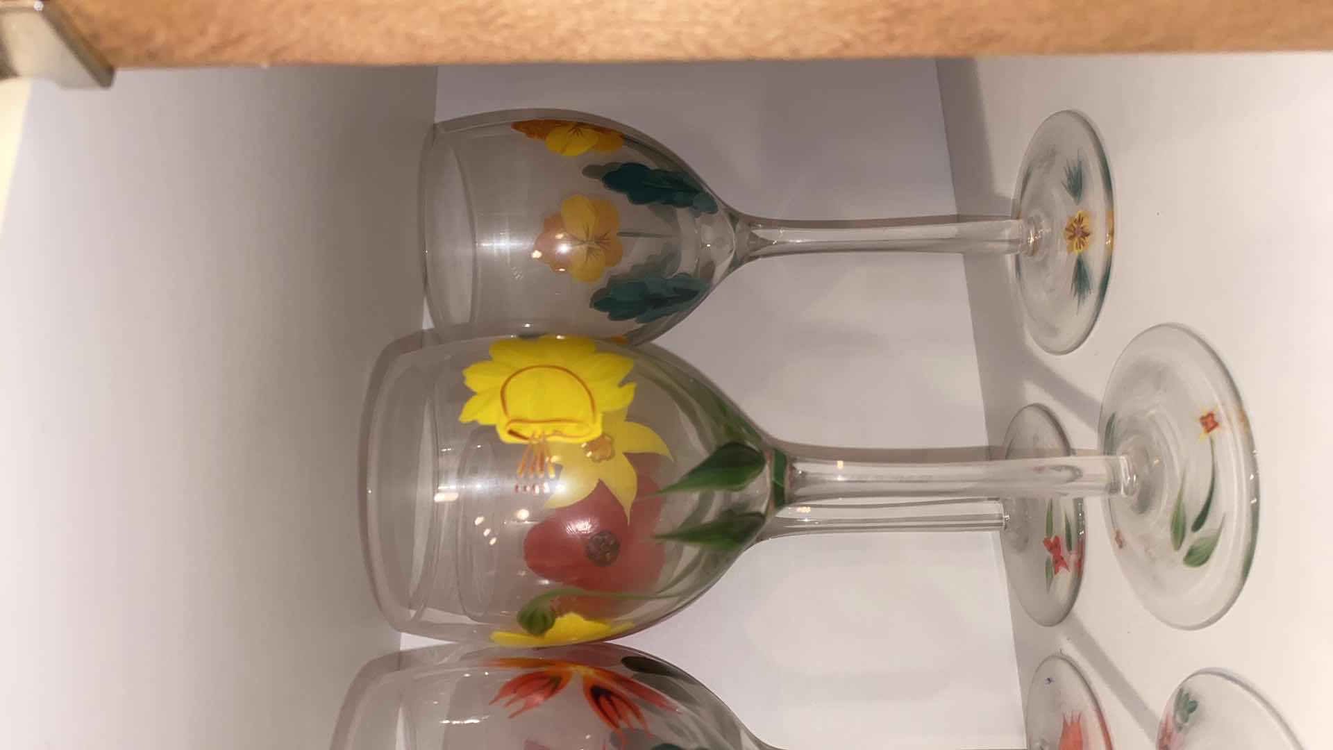 Photo 1 of CONTENTS OF CABINET - 1 SHELF 13 HAND PAINTED RED WINE GLASSES