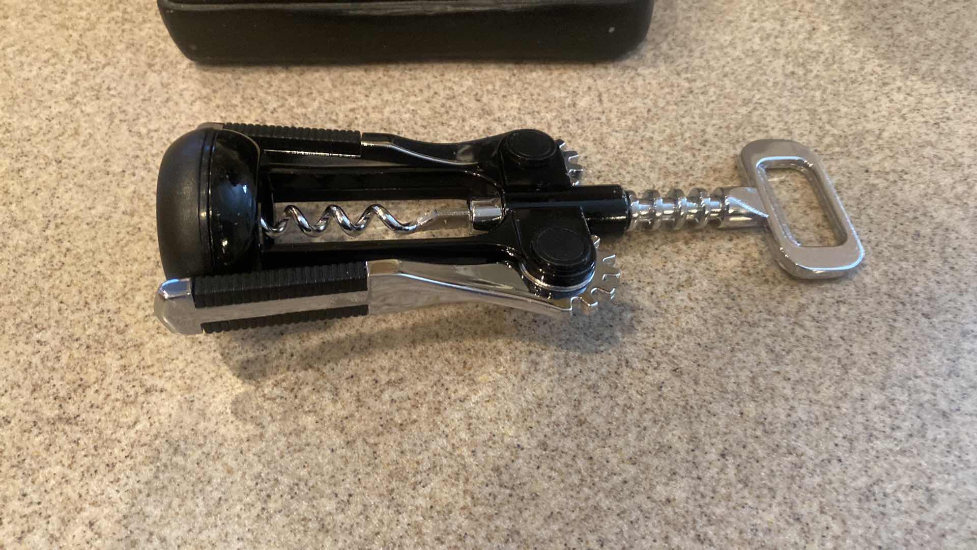 View 2 of RESIN CAST CHEF WINE HOLDER WITH WINE OPENER (wine not included) H18”