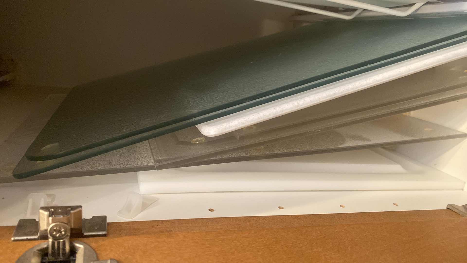 Photo 1 of CONTENTS OF CABINET - 8 CUTTING BOARDS