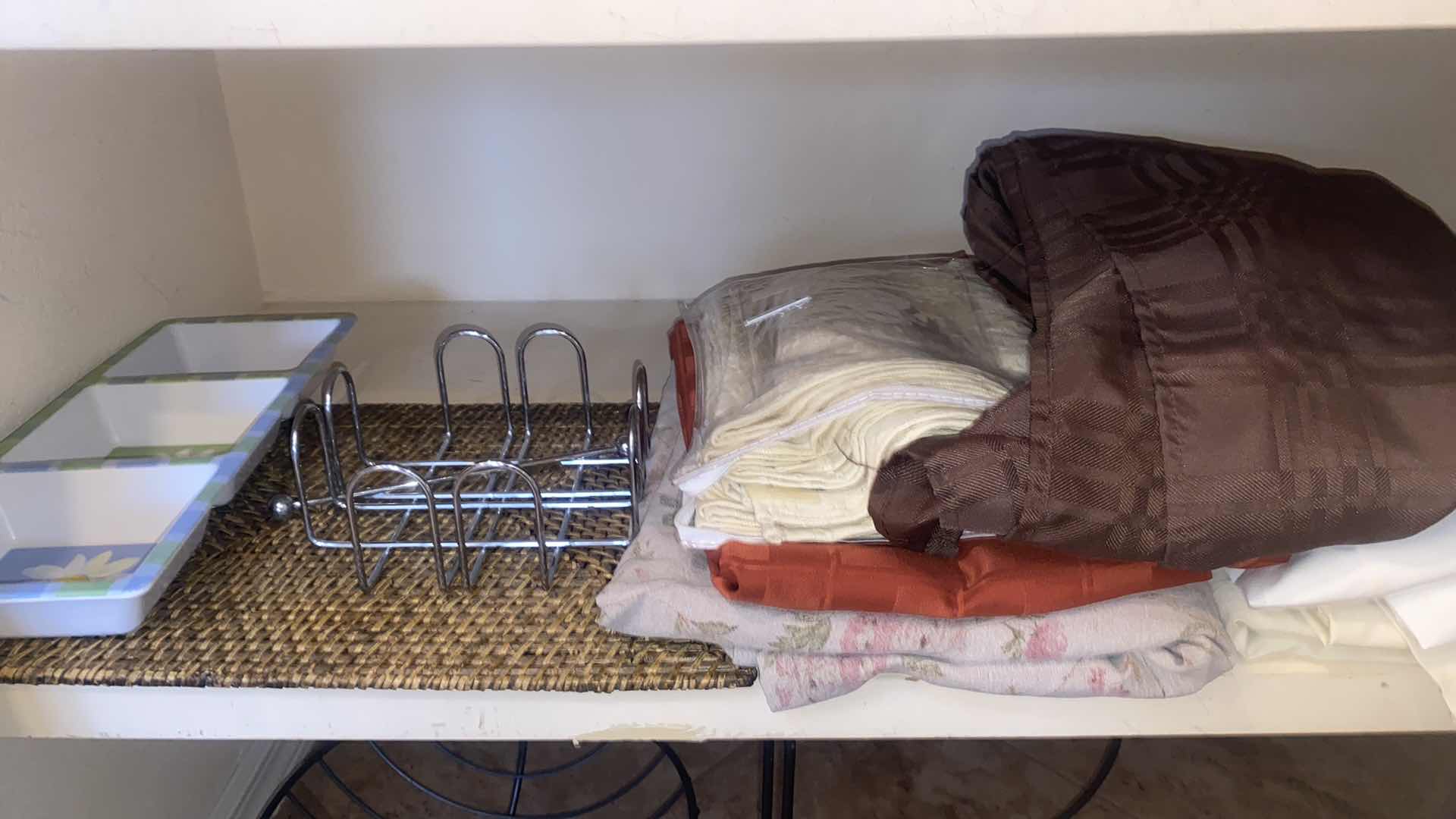 Photo 1 of CONTENTS OF CLOSET - KITCHEN PAPER BOWLS, PLASTIC STORAGE, NAPKINS TABLECLOTHS & METAL FRUIT BOWL & NAPKIN HOLDERS