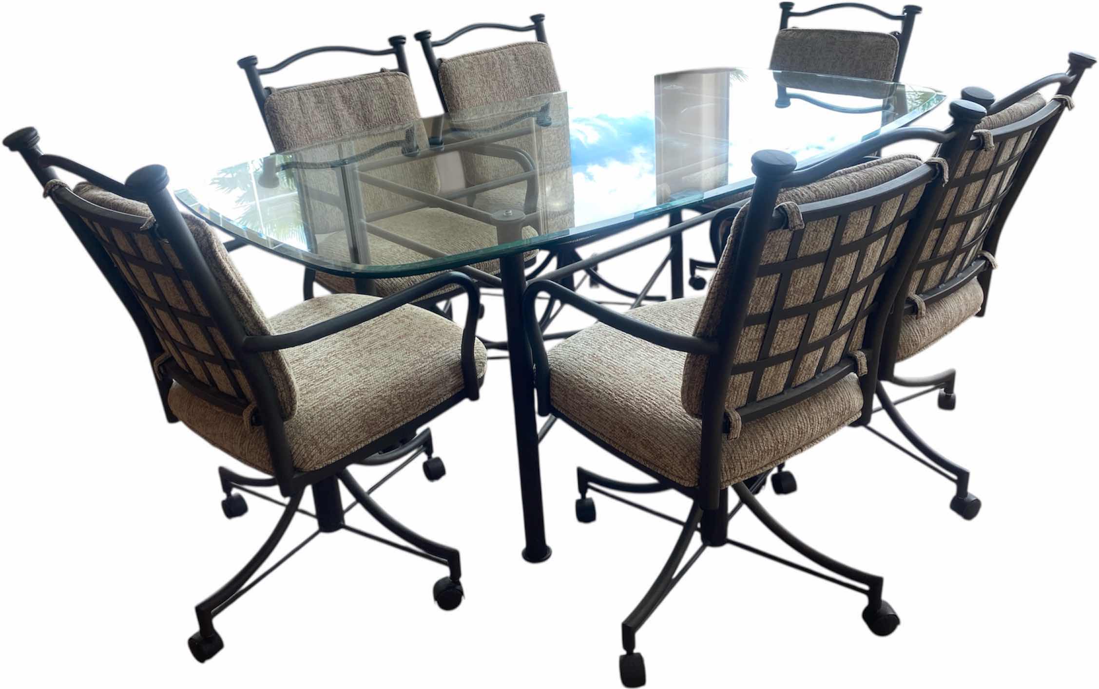 Photo 1 of 7 PIECE GLASS TOP & HEAVY METAL DINING SET, CHAIRS HAVE WHEELS, INCLUDES TABLE PADS 6’ x 42” H30”