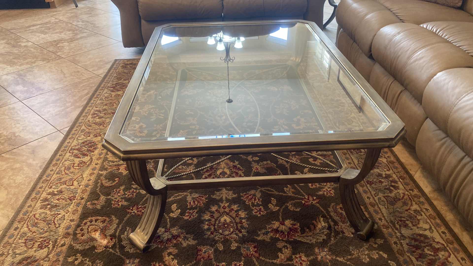 Photo 1 of HEAVY METAL COCKTAIL TABLE WITH BEVELED GLASS TOP 47” x 34” H17” (Sofa“table, and end table also available to be sold separately)