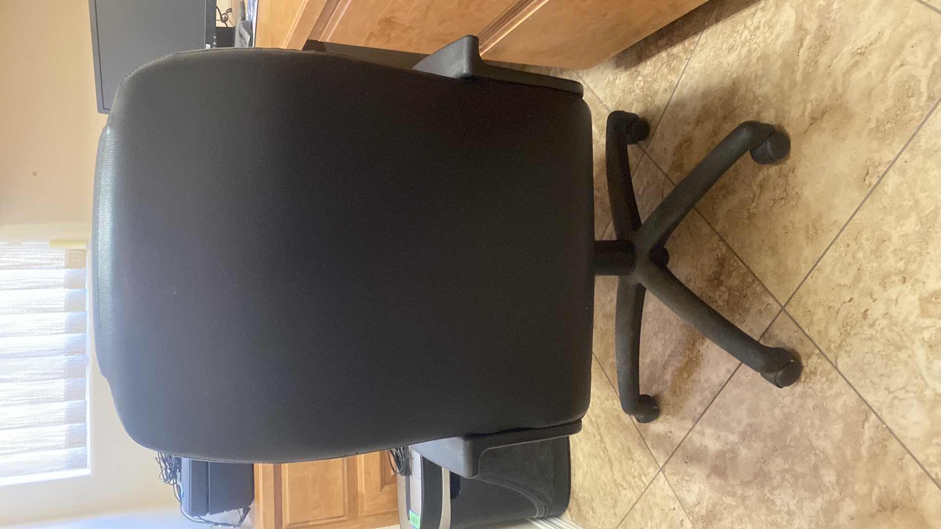 Photo 1 of BLACK BONDED LEATHER OFFICE CHAIR WITH WHEELS