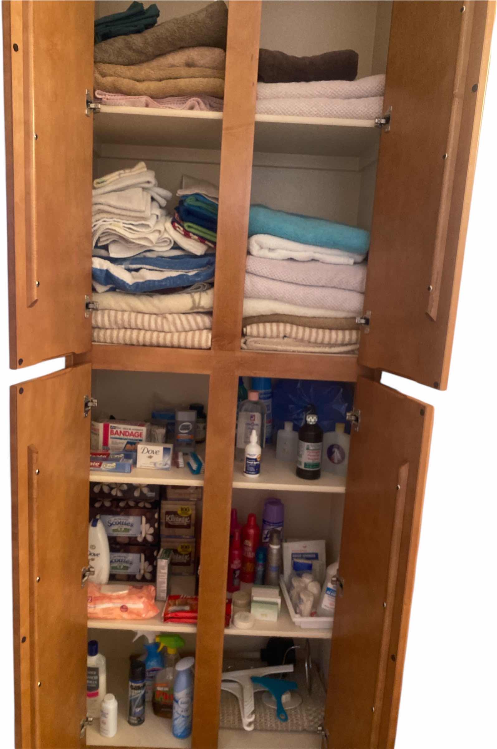 Photo 1 of CONTENTS OF CABINETS - BATH TOWELS & KLEENEX CLEANERS & HEALTH AIDS