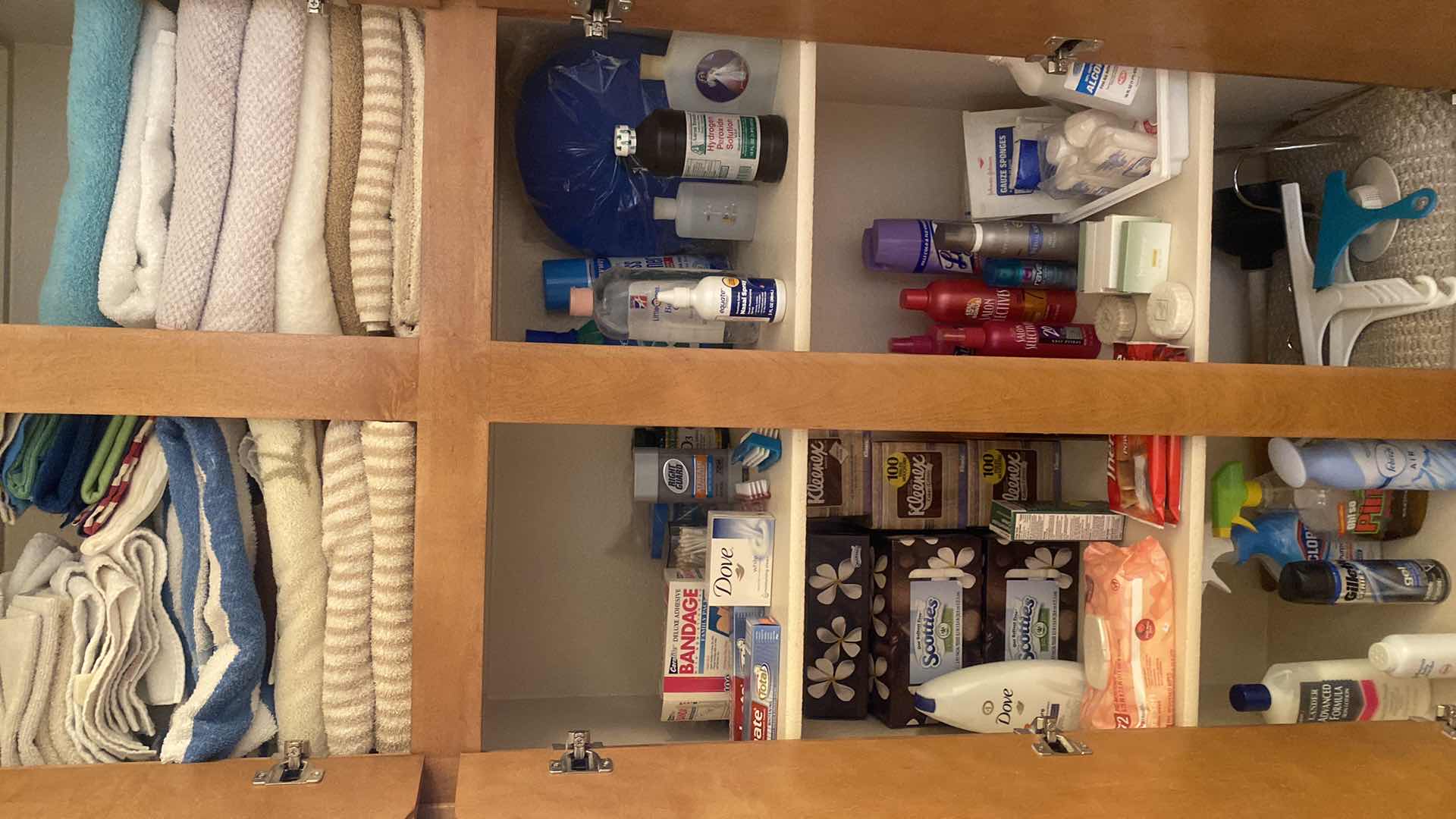 Photo 1 of CONTENTS OF CABINETS - BATH TOWELS & KLEENEX CLEANERS & HEALTH AIDS