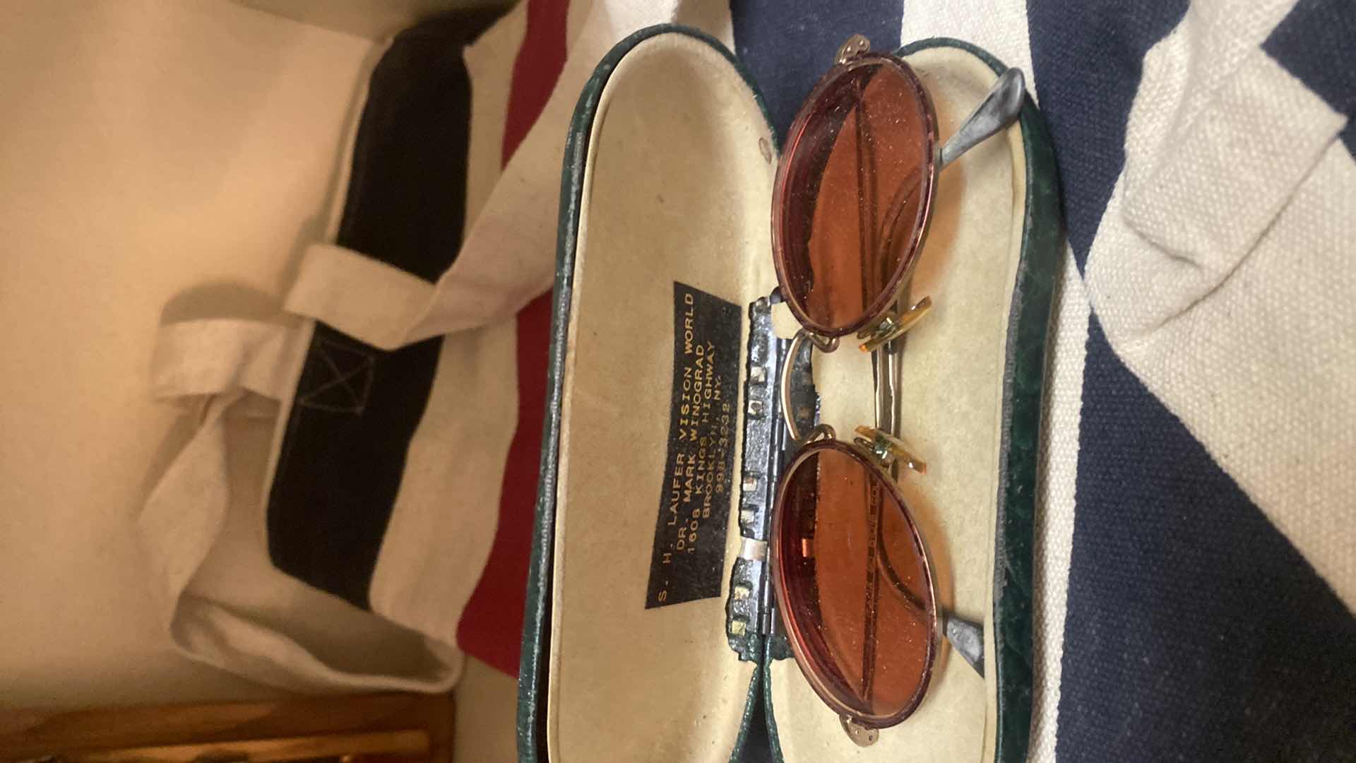 Photo 1 of 3 SHELFS WOMENS HATS, STRIPED BAG, CROSS , SUNGLASSES & WEIGHTS