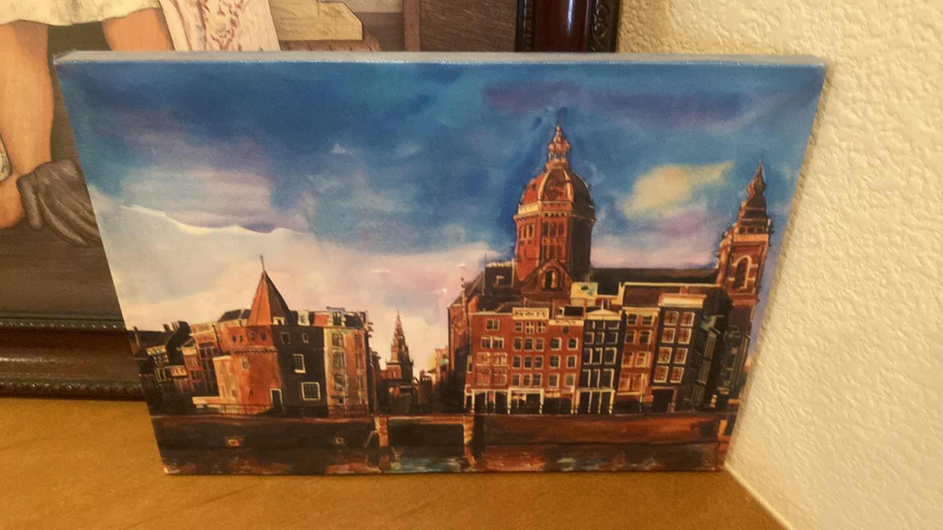 Photo 1 of 6-BOOKS NOVELS, STRETCHED CANVAS ARCHITECTURE ARTWORK & FRAMED GIRL PLAYING DRESS UP ARTWORK 19” x 23”