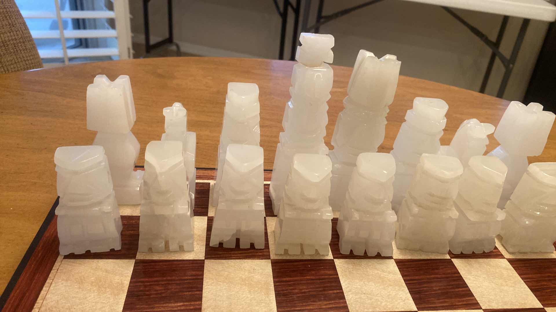 Photo 1 of CARVED ONYX CHESS SET (HEAD OF WHITE QUEEN NEEDS REPAIRED) ESR VALUE $125