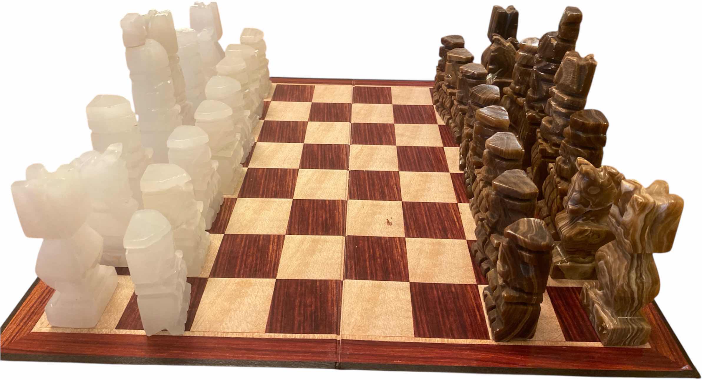 Photo 1 of CARVED ONYX CHESS SET (HEAD OF WHITE QUEEN NEEDS REPAIRED) ESR VALUE $125