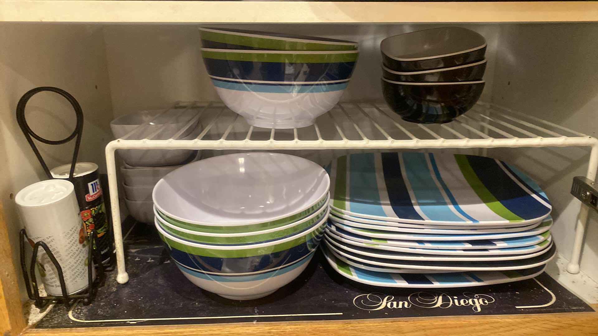 Photo 1 of CONTENTS OF CABINET - MELAMINE DINNERWARE & CERAMIC COFFEE CUPS