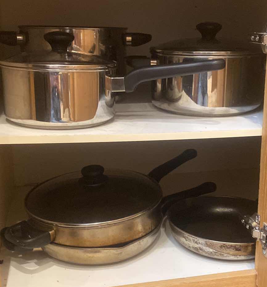Photo 1 of CONTENTS OF CABINET- ULTREX POTS & PANS 8 PC SET