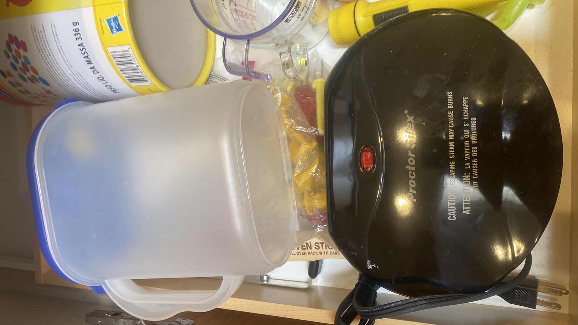 Photo 1 of CONTENTS OF CABINET-KITCHEN TOOLS