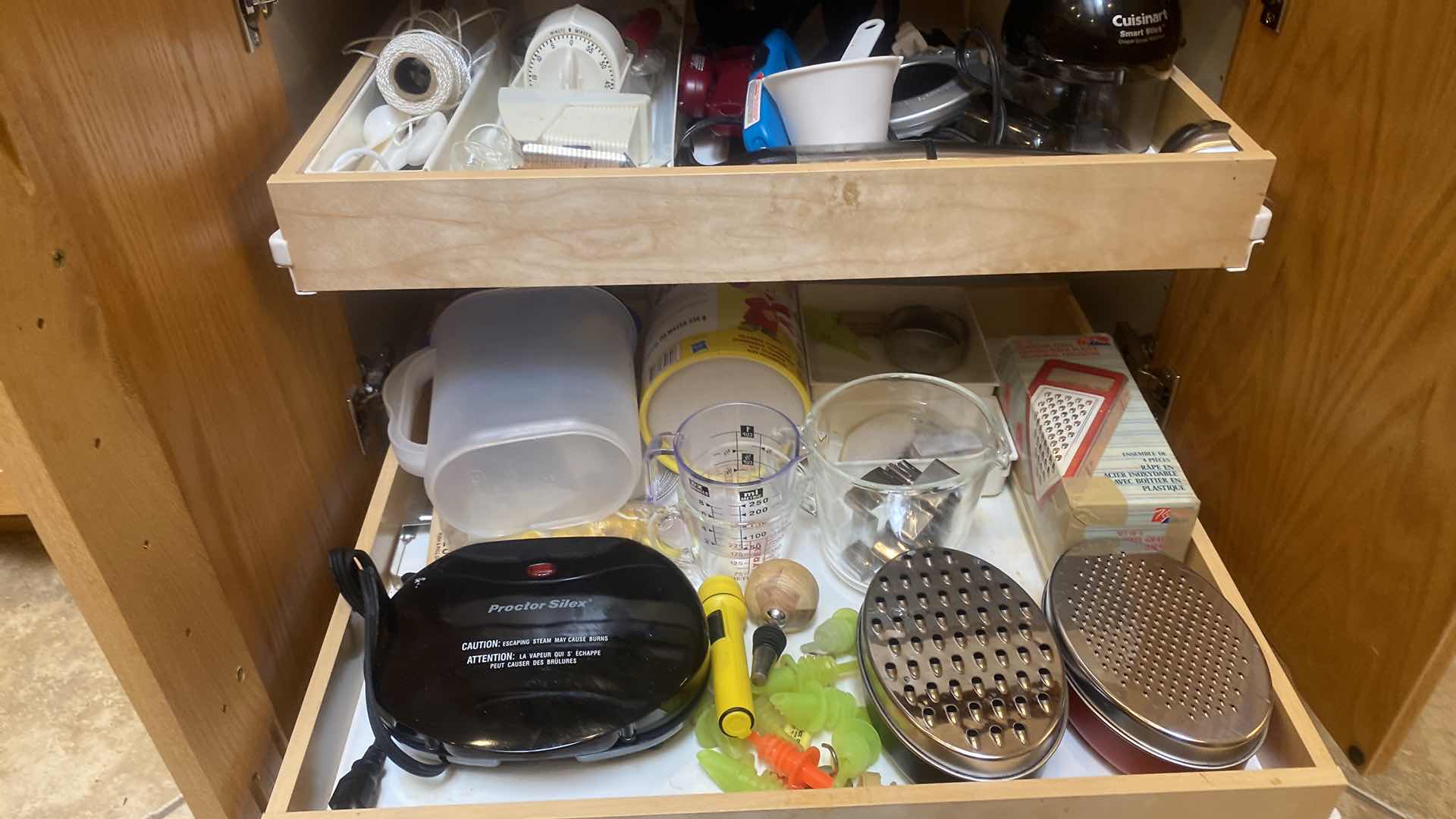 Photo 1 of CONTENTS OF CABINET-KITCHEN TOOLS