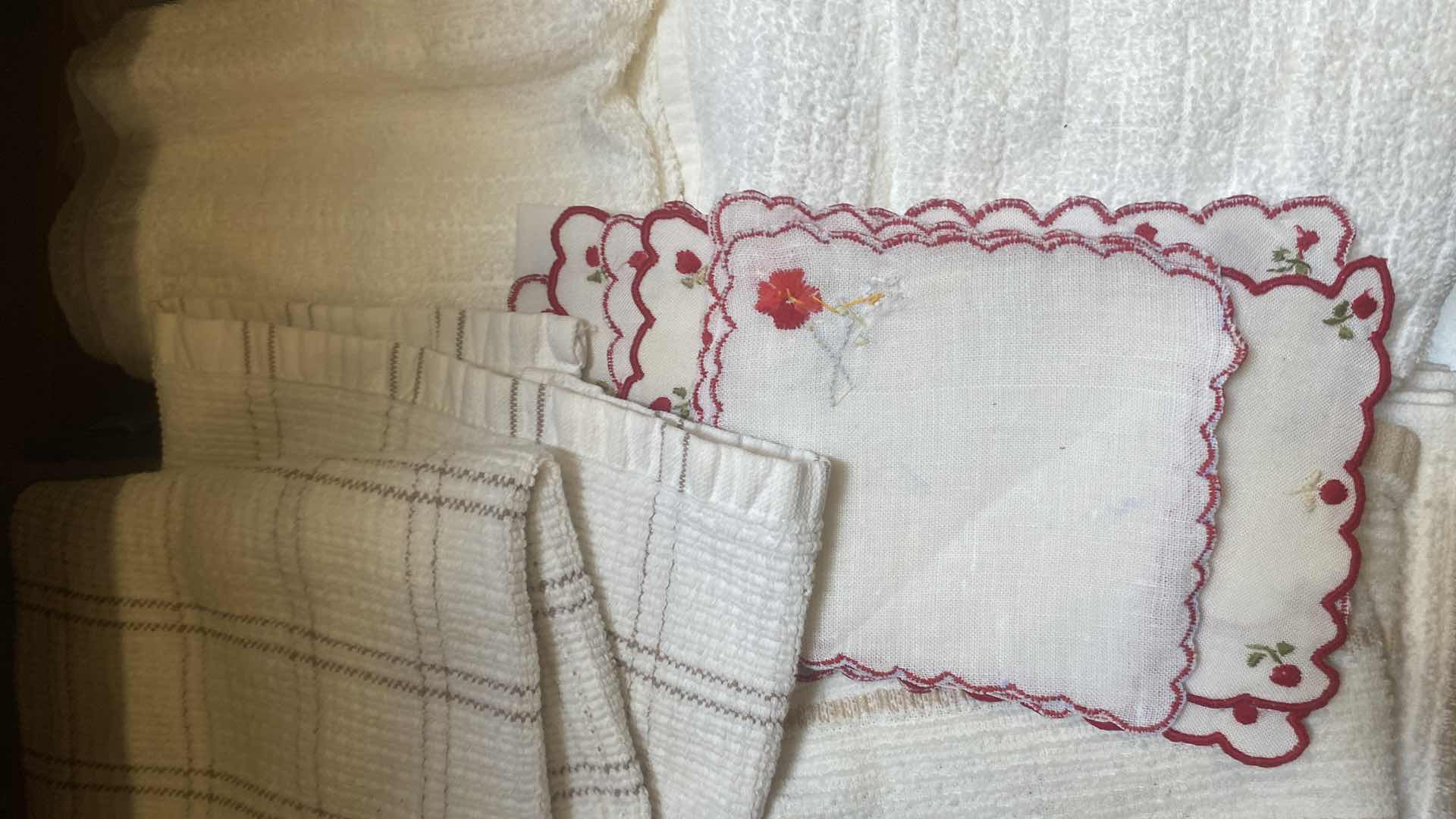 Photo 1 of CONTENTS OF CABINET-DISH TOWELS & POT HOLDERS