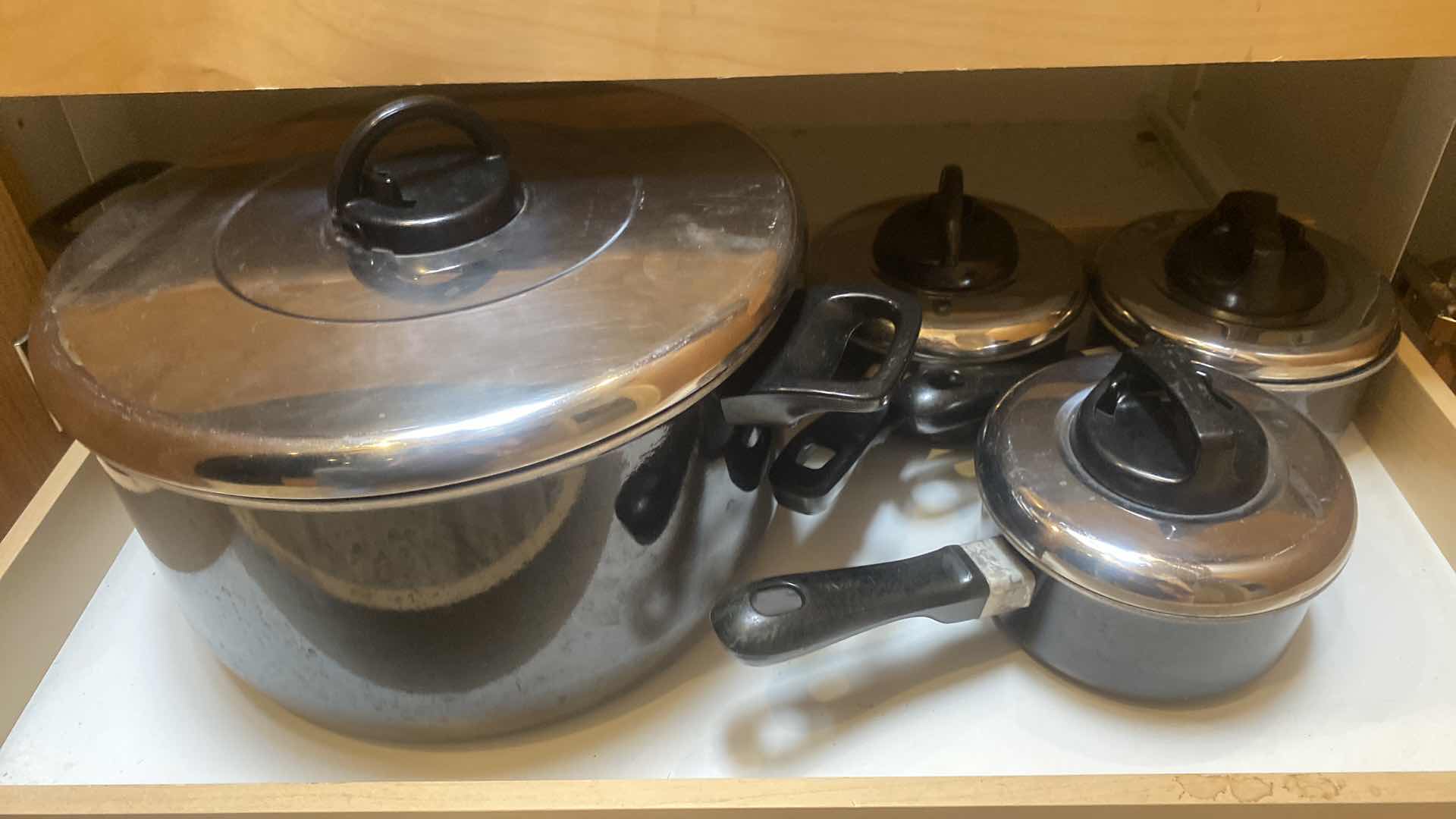 Photo 1 of CONTENTS OF CABINET-T FAL POTS AND PANS