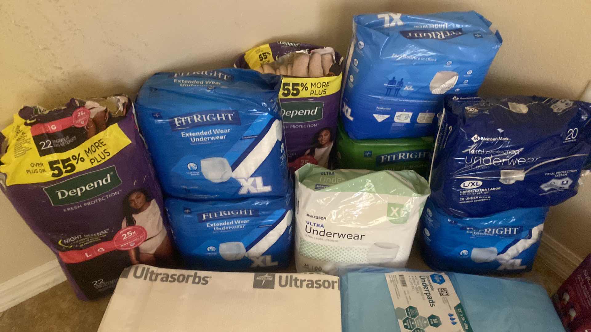 Photo 1 of DEPENDS UNDERGARMENTS SIZES LARGE AND X LARGE AND UNDERPADS