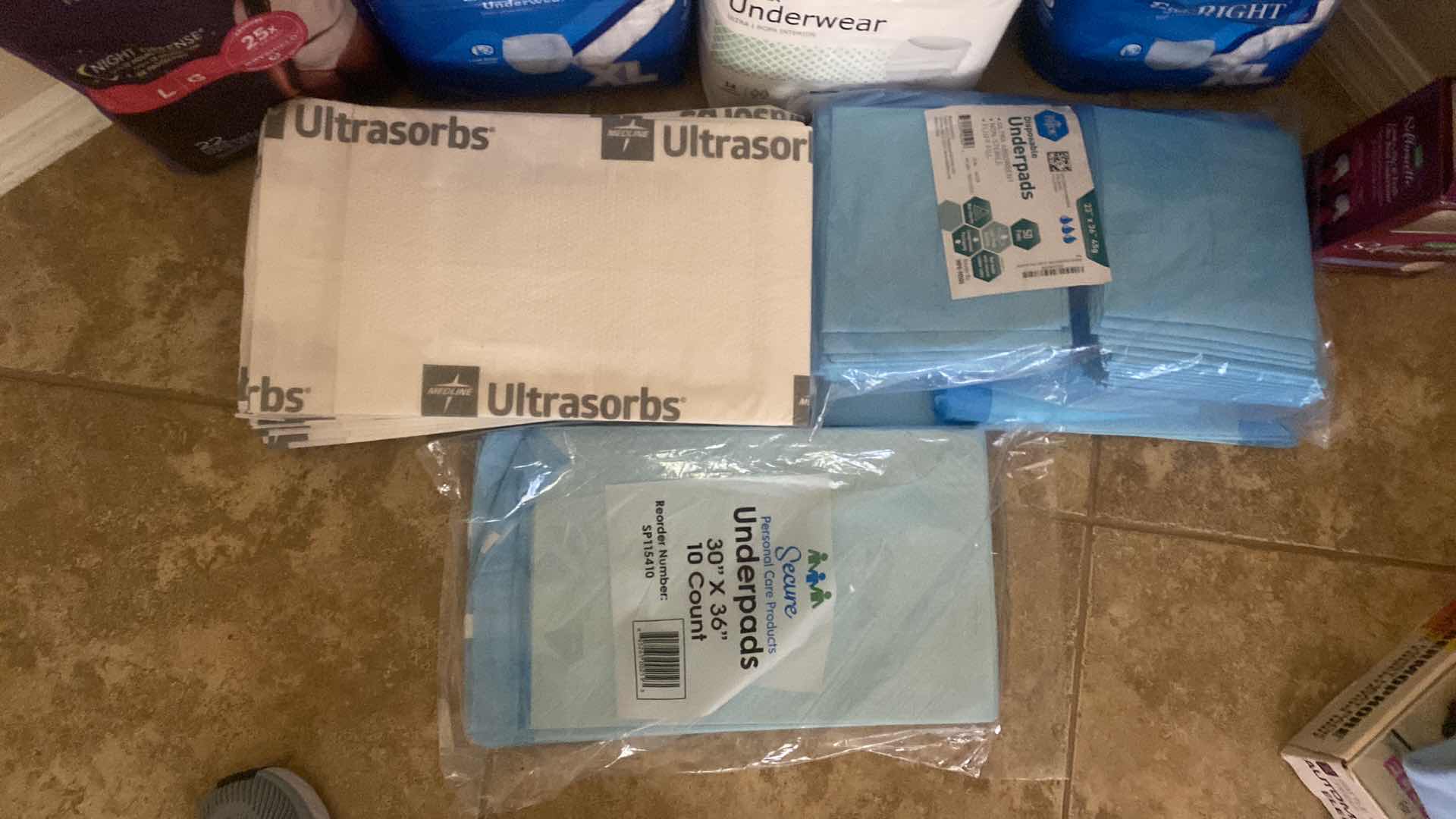 Photo 1 of DEPENDS UNDERGARMENTS SIZES LARGE AND X LARGE AND UNDERPADS