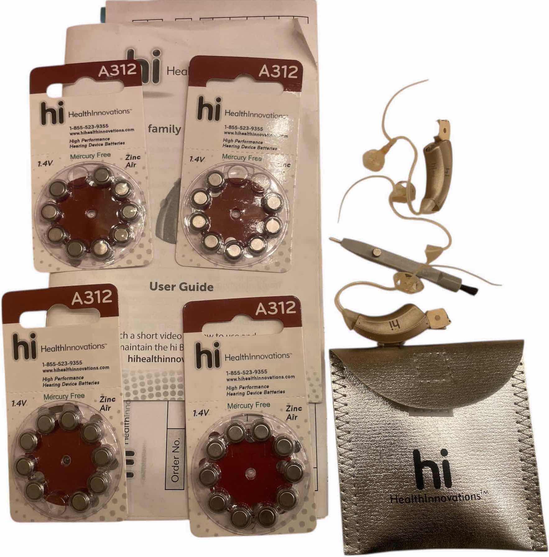 Photo 1 of HI HEARING AIDS WITH BATTERIES & BOOKLET EST VALUE $330.00