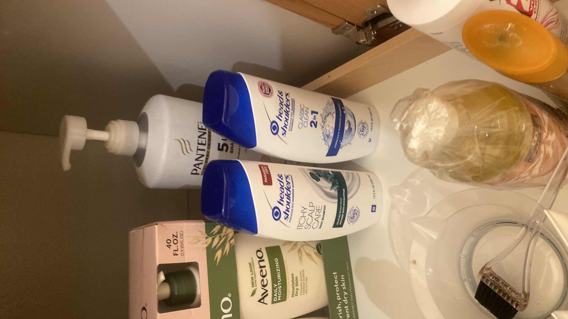 Photo 1 of CONTENTS OF CABINET - NEW SELF CARE PRODUCTS & CARUSO PROFESSIONAL CURLERS