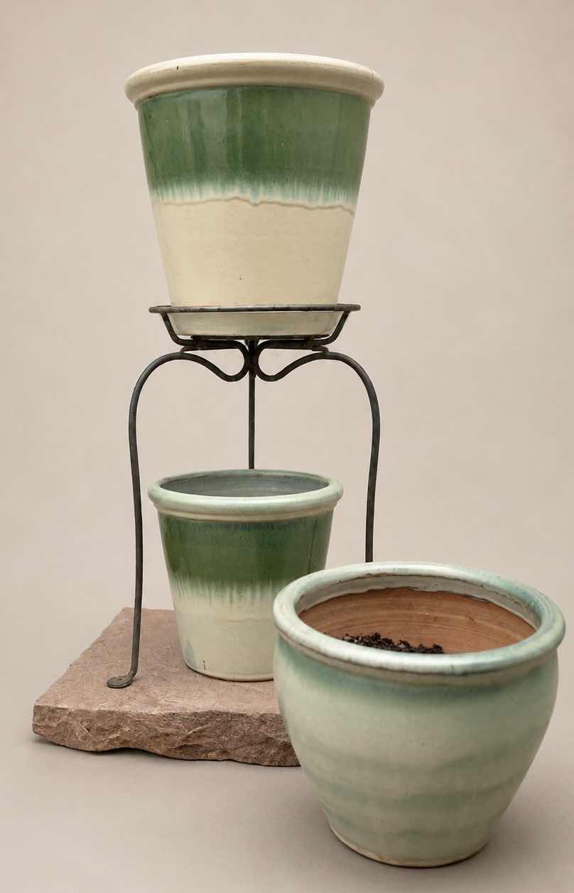 Photo 1 of THREE CERAMIC POTS