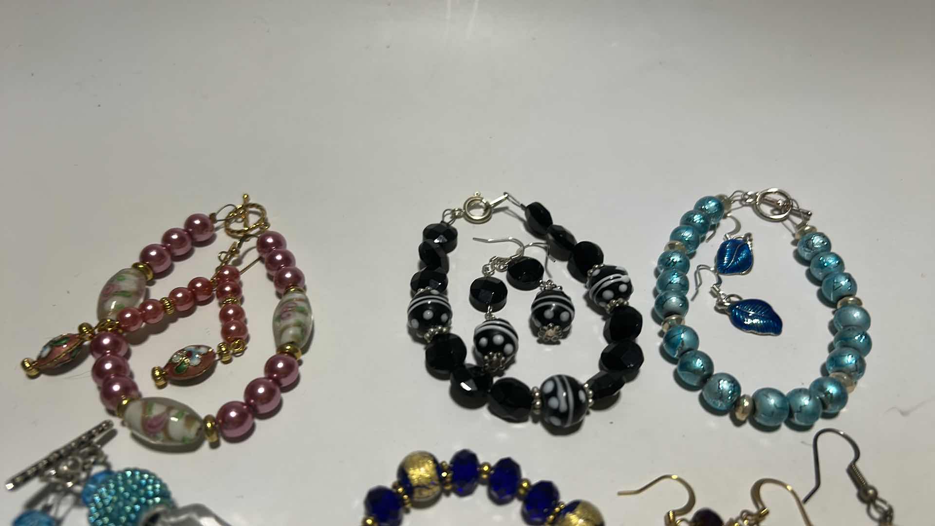 Photo 1 of 5 CUSTOM DESIGNED BRACELETS AND 6 PAIRS OF EARRINGS