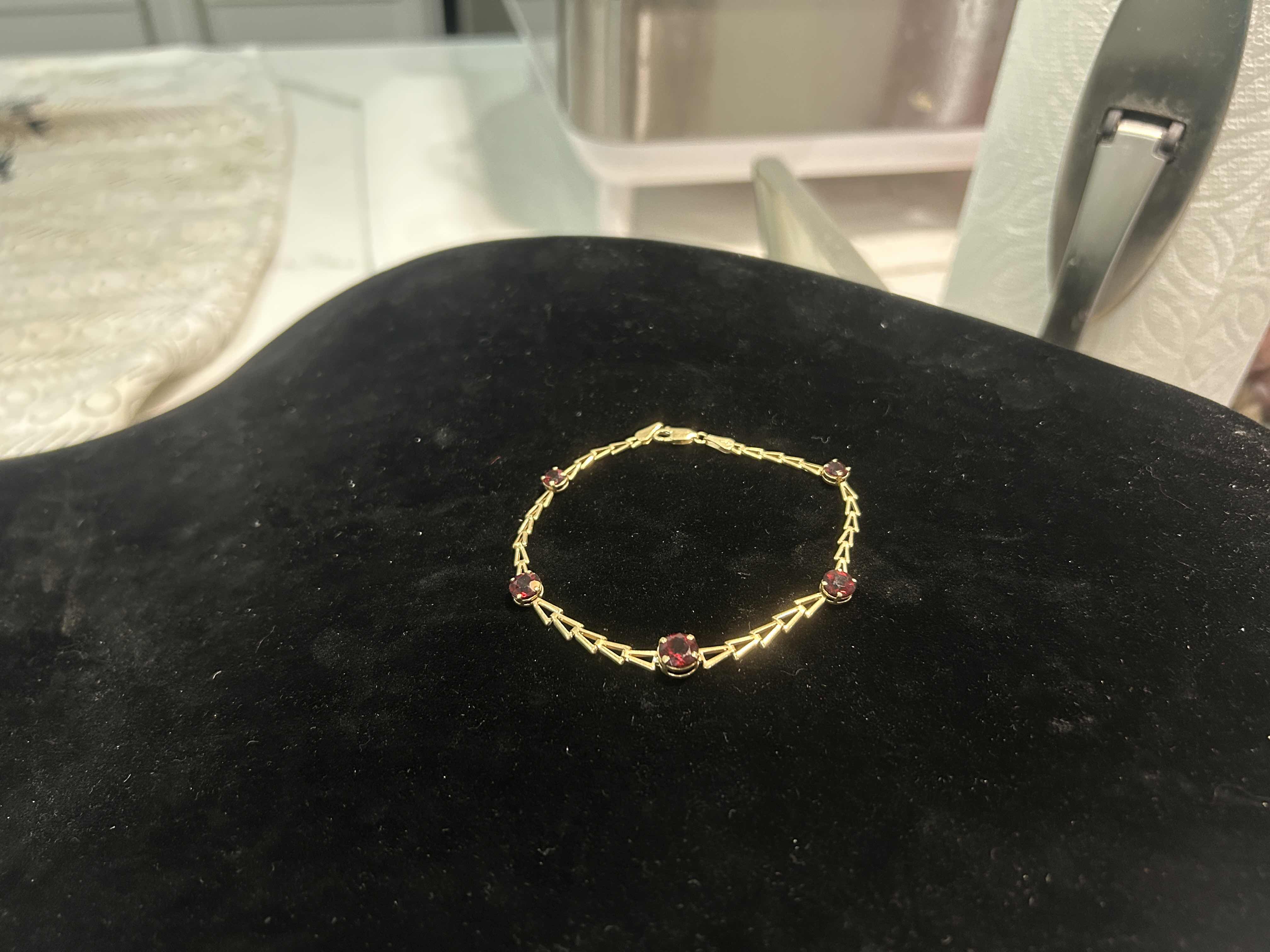 Photo 1 of 14K GOLD BRACELET WITH RED GEM STONES