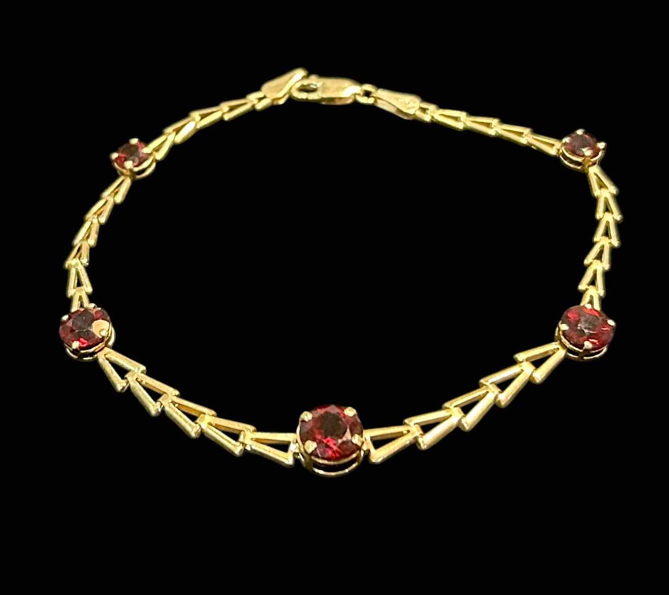 Photo 1 of 14K GOLD BRACELET WITH RED GEM STONES