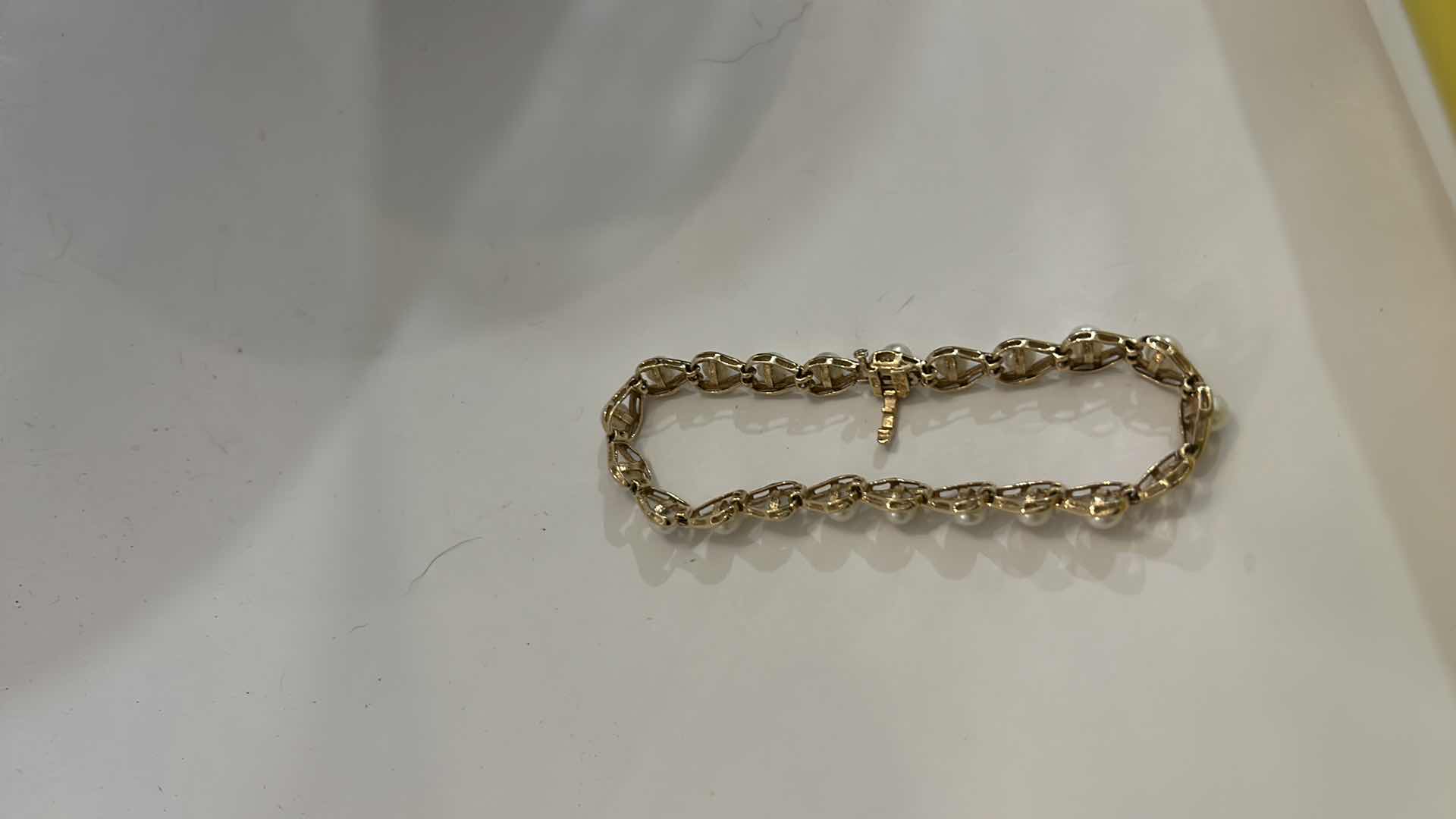 Photo 1 of 14K GOLD PEARL TENNIS BRACELET ( MISSING ONE PEARL)