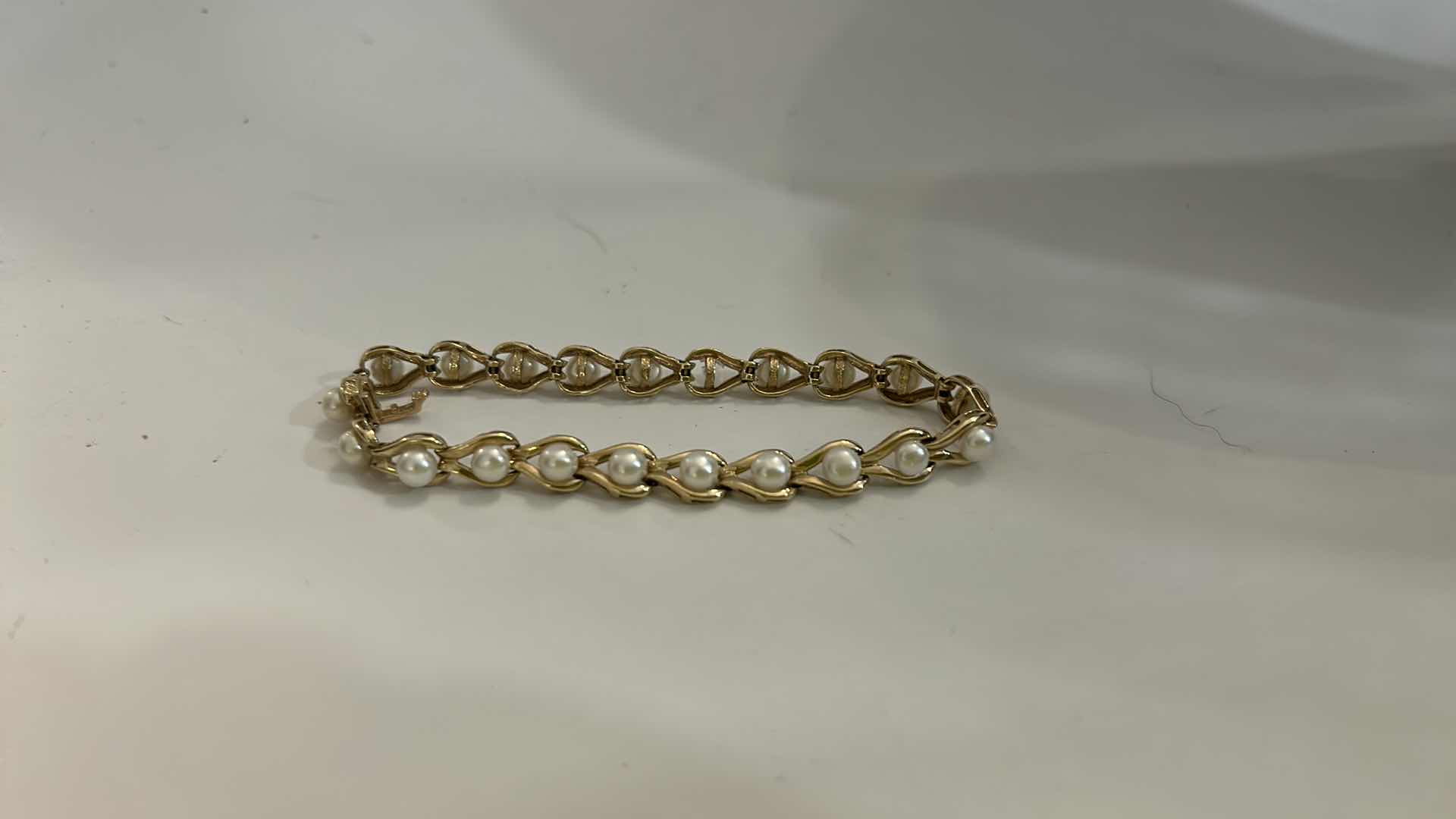 Photo 1 of 14K GOLD PEARL TENNIS BRACELET ( MISSING ONE PEARL)