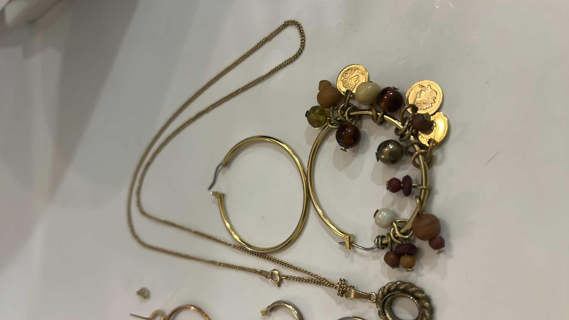 Photo 1 of 14K GOLD JEWELRY BROKEN OR MISSING PIECES ( NECKLACE AND PENDANT STAMPED 14K, ALL OTHERS MAGNET TESTED)